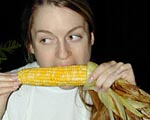 corn on the cob days - lady eating corn